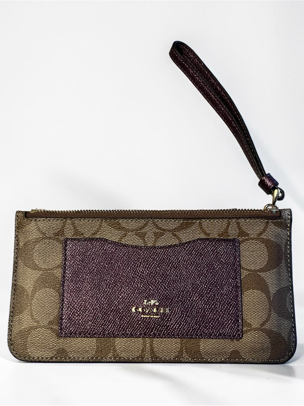 Coach Brown Signature Canvas Wristlet with Plum Pocket